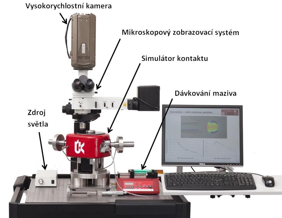 MATERIÁL A METODY 4.2 Měřící aparatura (simulátor kontaktu) V prostorách Ústavu konstruování v Brně bylo postupně vytvářeno a upravováno zařízení (obr.