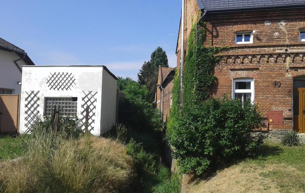Nelešovický potok, Nelešovice rekonstrukce opěrných