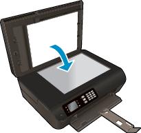 2. Umístěte předlohu do pravého rohu skla skeneru potištěnou