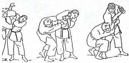 1 ) 2) a 3) obránce provede teisho úder na nos útočníka a hned provede techniku ude hishigi-waki-gatame 4) Obrana: při ohrožení (míření pistolí) zepředu: obránce pomalu