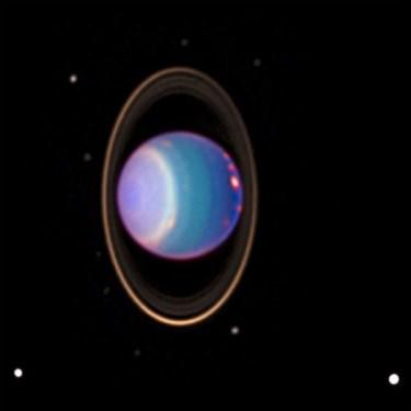 Uran - překocená planeta osa rotace kolmá k ose oběhu - ledová planeta zmrzlá voda -