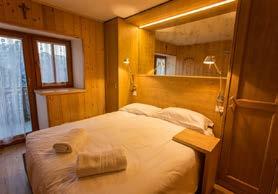 patro: neuzavíratelná ložnice s manželskou postelí s, sauna. Terasa s posezením.