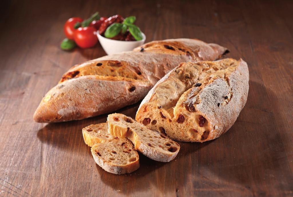 Ciabatta mix 5 % Bagety se sušenými rajcaty 10,000 kg pšeničná mouka hladká 0,500 kg Ciabatta mix 5 % (1980) 7,300 kg voda (cca) 0,220 kg sůl 0,250 kg droždí 2,000 kg sušená rajčata nebo olivy 20,270