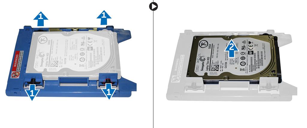 7 Pokud je nainstalován 3,5palcový pevný disk, roztáhněte držák pevného disku na obou stranách k uvolnění pevného disku.