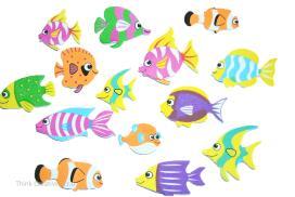tropických rybek, barevný písek
