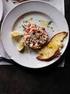 Salmon steak tartare with capers and basil pesto, served with toasted white bread. Homemade pâté with cranberry sauce, served with home-baked bread