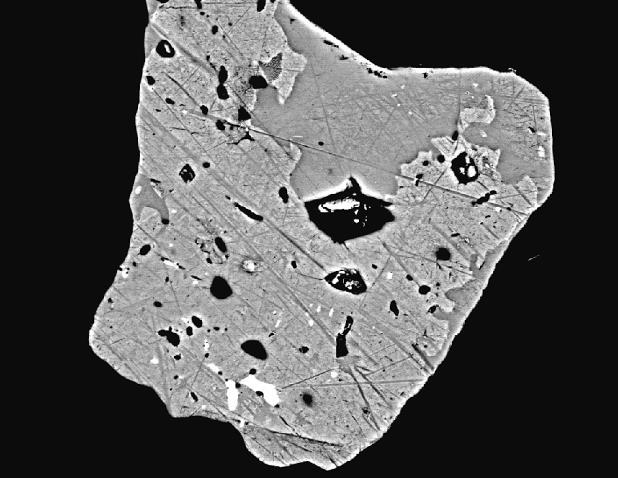 occurring (less abundantly than miargyrite) in milky quartz gangue associated with miargyrite and freibergite of ore (iii) or in cavities of the kutnohorite quartz gangue of red ore (ii), associated