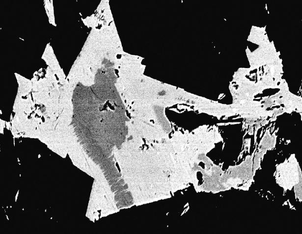 (a) Andorite of blackiv ore (Ad4) (i) isreplaces replacedag-excess by andorite fizélyite IV (Ad4), (); which (b) grain is subsequently of Ag-excess replaced fizélyite by andorite () in kutnohorite VI