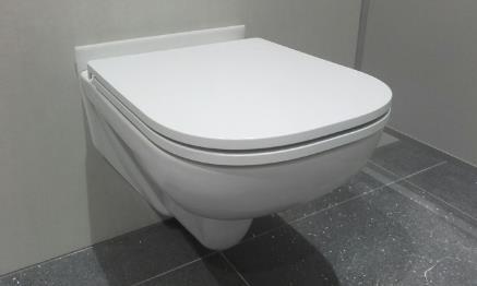 (b) Vybrané WC osadit dvojitým držákem toaletního papíru JUMBO (požadujeme vzorkovat). Obr. 17 IX.
