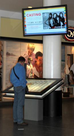 (Digital Signage Centrum Chodov 2012 a Centrum Černý Most 2013; prezentace Visual Impact, 2012).