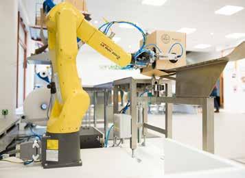 Promyšlené obalové pracoviště zefektivní vaši práci Robot pro manipulaci s
