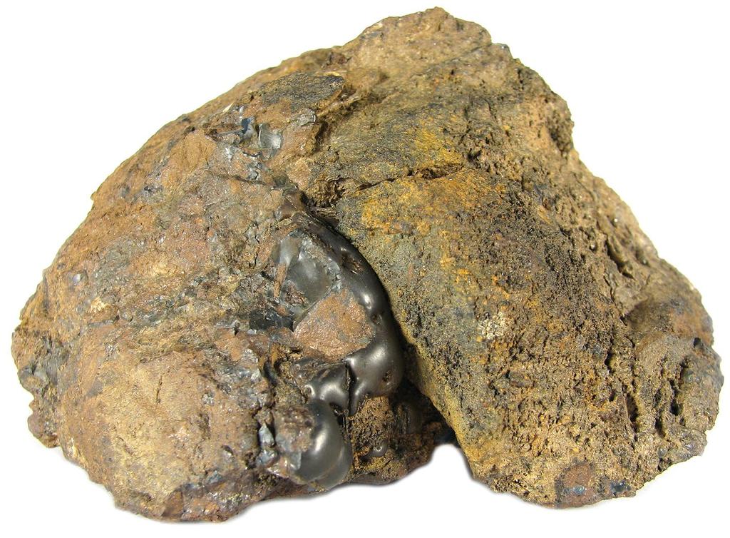 104 Bull. mineral.-petrolog. Odd. Nár. Muz. (Praha) 23, 1, 2015. ISSN 1211-0329 (print); 1804-6495 (online) Obr. 1 Bradavčité agregáty šedočerného hollanditu/kryptomelanu v puklině železné rudy.