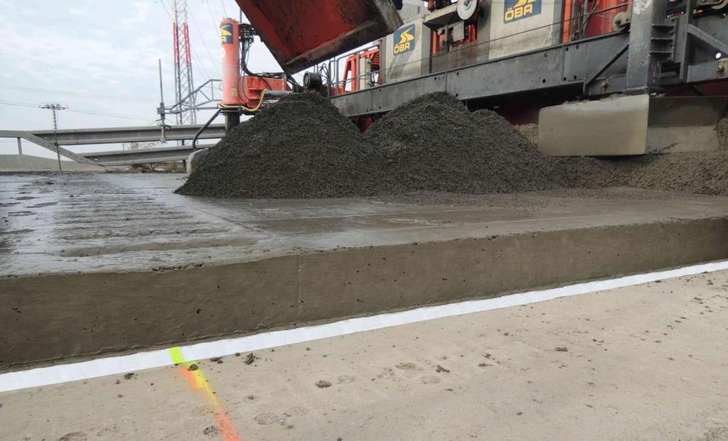 Dálnice D2 rekonstrukce cementobetonové vozovky netkaná geotextilie o plošné hmotnosti 500 g/m 2 polypropylen (PP) - odvádí mimo vozovku