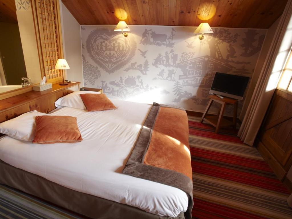 Deluxe Rooms 5 Deluxe Rooms Prostorné pokoje s odděleným obývacím pokojem a