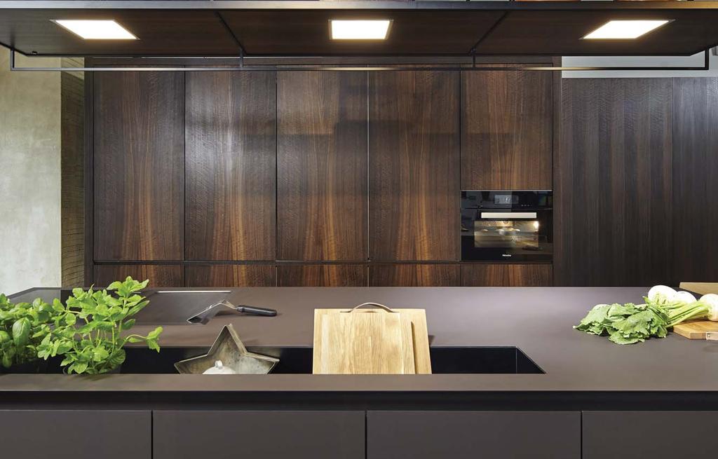 The work zone can be instantly concealed behind sliding panels.