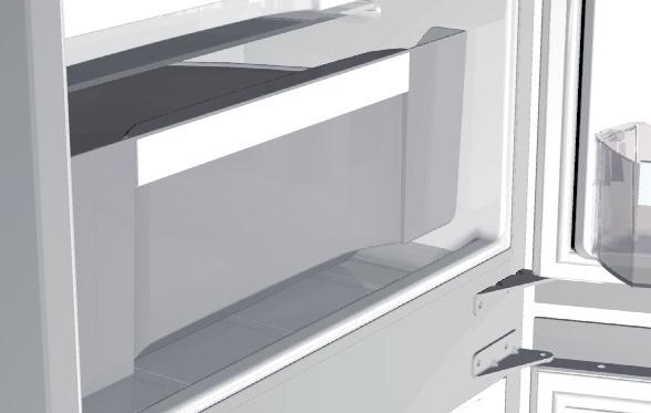 Regál by měl být v lednici umístěn tak, aby nebránil zavírání dveří. Maximální kapacita je 9 lahví 0,75 l nebo 13 kg celkové hmotnosti viz štítek na pravé straně vnitřní stěny lednice.