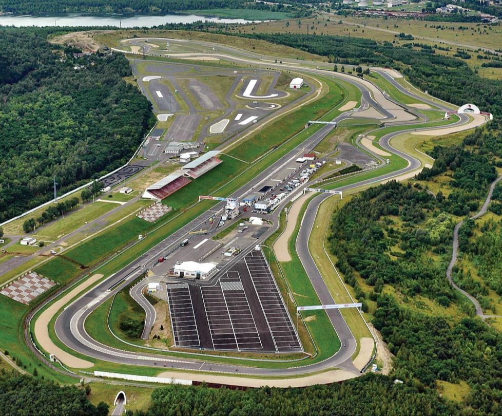 AUTODROM MOST a.s. - závodní okruh a polygon - (kurzy řízení, škola smyku atd.