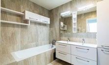 Mezonet rovněž disponuje šatnou, sklepem, balkonem o velikosti 5 m² s výhledem do ulice a dvěma venkovními parkovacími stáními.