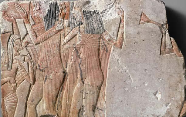 Obr. 02. Tanečníci s doprovodem na trumpetu aerofonu se v egyptských záznamech objevuje jako dd-m-šnb, což doslovně překládáme jako: ten, který vypráví zvukem trumpety. 8 Další reliéfy pocházejí z 18.