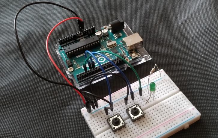 Změna jasu LED pomocí dvou tlačítek Zapojme nyní dvě tlačítka a LED. Stiskem prvního tlačítka se bude jas plynule zvyšovat, druhým snižovat.
