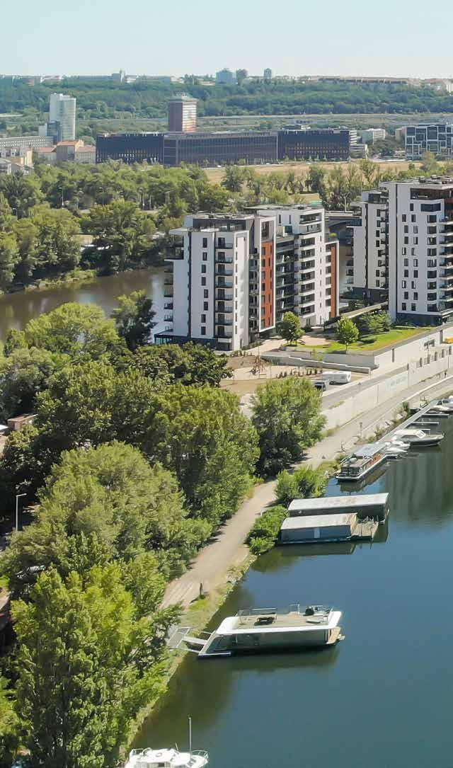 NOVÁ ČTVRŤ NA BŘEHU VLTAVY ON RIVERSIDE OF THE RIVER VLTAVA Přestavba kdysi nejvýznamnějšího pražského holešovického přístavu je inspirována podobnými proměnami ve světových velkoměstech, Londýně,