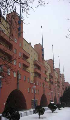 Balconies or loggias placed into the façade, or a protruding balconies and exposed semicircular enclosures. They are also the primary and often the only articulation of the facade of the building.