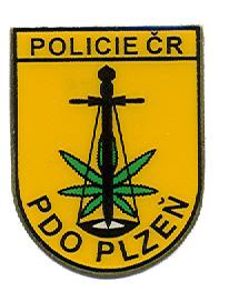 Z přední strany je vyobrazen znak NPC s opisy Policie České republiky Národní protidrogová