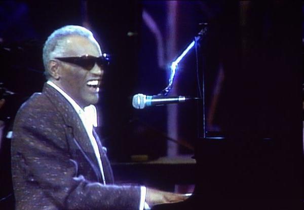 Ray Charles - kanadský král soulu zpívající klavírista, od 6 let slepý,