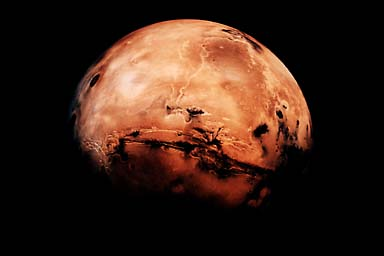 Mars Mars je velmi chladná planeta, na níž je velmi mnoho vyhaslých sopek, kráterů a vyschlých řek. Povrch připomíná rezavou kamenitou poušť.