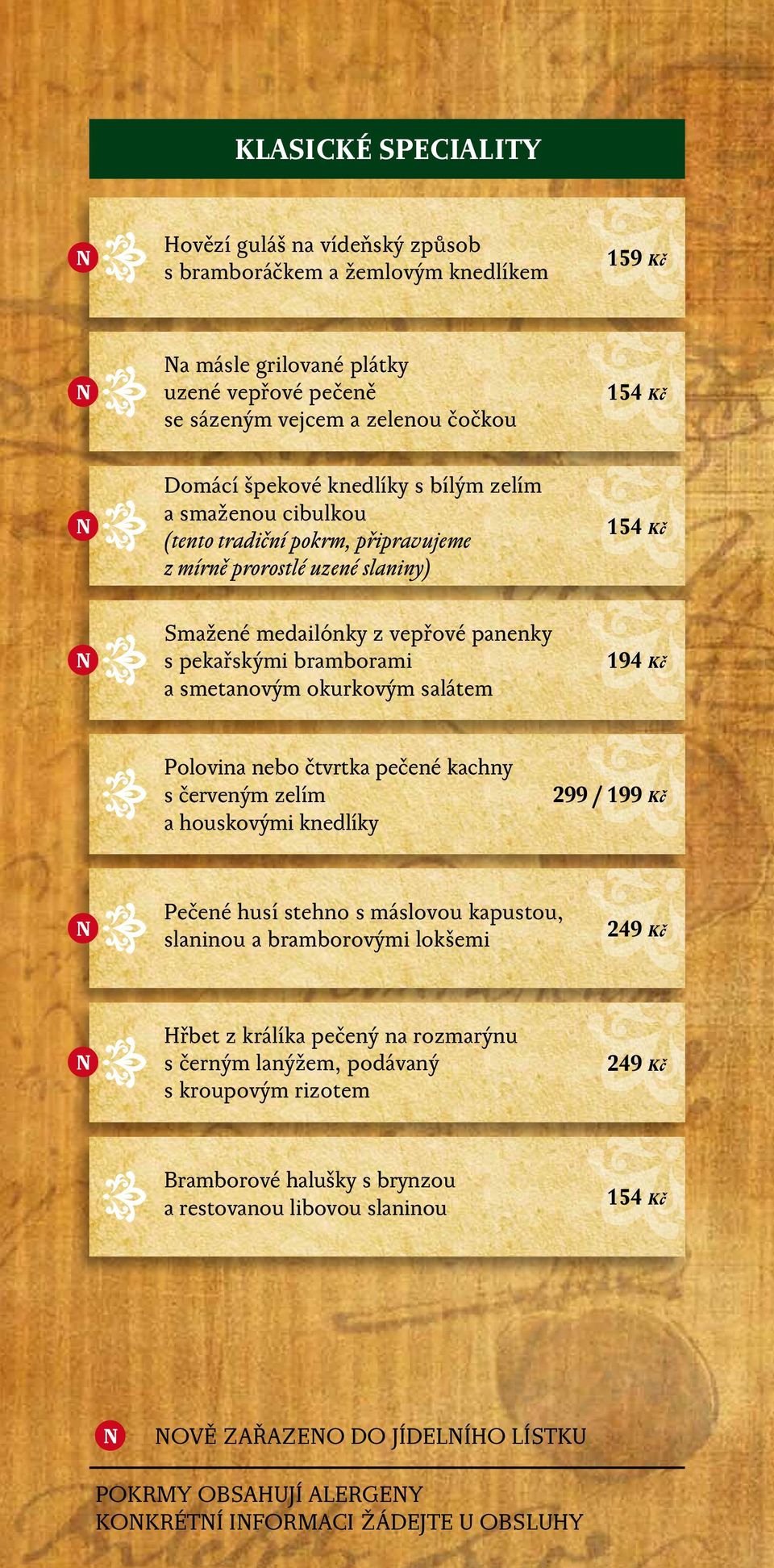 pekařskými bramborami a smetanovým okurkovým salátem 1 Polovina nebo čtvrtka pečené kachny s červeným zelím a houskovými knedlíky 299 / 199 Kč Pečené husí stehno s máslovou