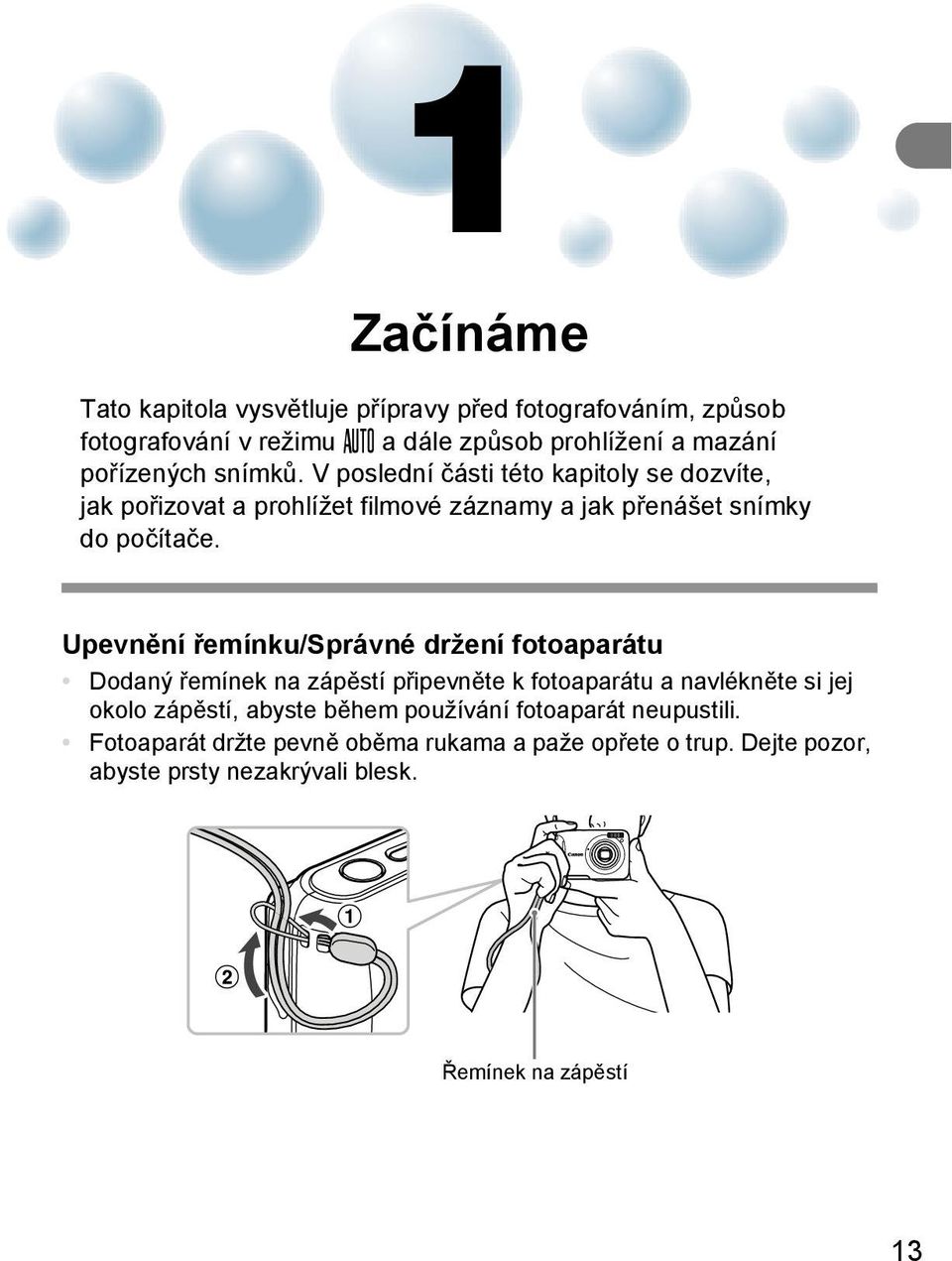 Upevnění řemínku/správné držení fotoaparátu Dodaný řemínek na zápěstí připevněte k fotoaparátu a navlékněte si jej okolo zápěstí, abyste během