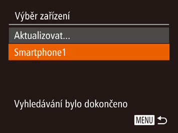 3 Vyberte položku [ Stisknutím tlačítek [ ][ ] nebo otočením voliče [ ] vyberte položku [ ] a potom stiskněte tlačítko [ Zobrazí se identifikátor SSID fotoaparátu.