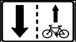 E 12c Povolený směr jízdy cyklistů 21. V příloze č.
