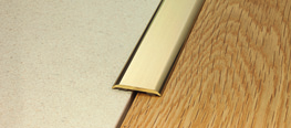 Profily pro podlahy o stejné výšce 25/A eloxovaný hliník stříbro 525/A leštěná mosaz 19/ PROCLASSIC F bal.