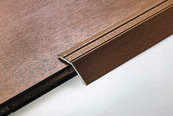 Profily pro dřevěné a laminátové podlahy Prestowood 29/A, 51/A a 52/A je řada samolepících profilů pro jednoduchou a rychlou instalaci na podlahy o nestejné výšce.