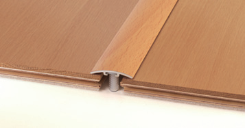 Profily pro dřevěné a laminátové podlahy Prosystem 27/ST a 29/ST jsou přechodové profily pro dřevěné a laminátové plovoucí podlahy.
