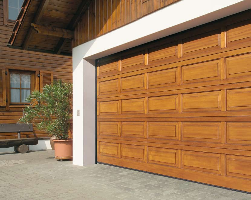 Tip Vaše dřevěná vrata budou komfortní, vybavíte-li je vhodným pohonem garážových vrat. Doporučujeme silný pohon Hörmann SupraMatic P.