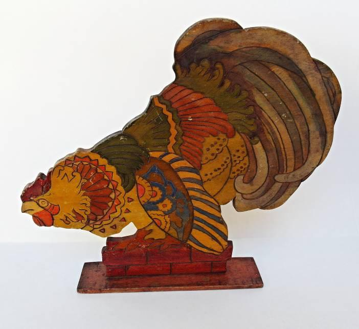 Obr. 13 9 x 3,5 x 11,6 cm Barevný pták připomínající kachnu, chybí část podstavce Obr.