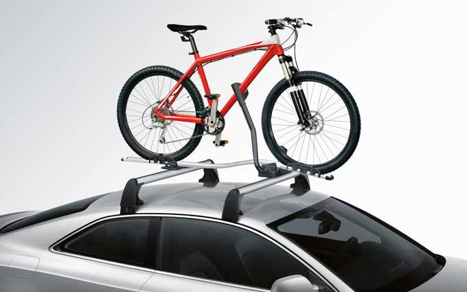 2 3 1 Nosič bicyklov s upevnením vidlice kolesa komfortná manipulácia; uzamykateľný. Vhodný pre cestné bicykle s rýchloupínacím nábojom predného kolesa. Maximálna nosnosť 17 kg.