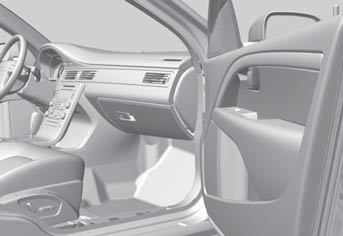 01 Bezpečnost Systém airbagů (SRS Airbag) 01 přihrádkou v přístrojové desce. Panel airbagu je označen nápisem SRS AIRBAG.
