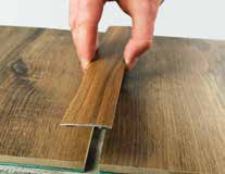 Clean the floor properly from the smear and dust in the place where the cover (stair) strip is going to be
