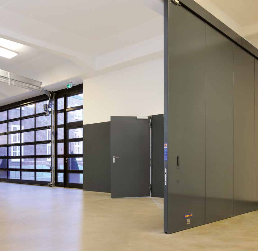 Dveřní a vratové systémy pro stavbu objektů Průmyslová vrata, nakládací technika, vnitřní a vnější