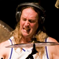 bubeníkem Carl Palmerem z legendárních Emerson Lake & Palmer dostal název Duo Vir2osity.