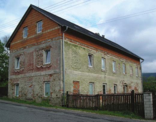 STAVEBNÍ MATERIÁL PRO ZDRAVOU FASÁDU Zateplení bytového domu, severní Čechy