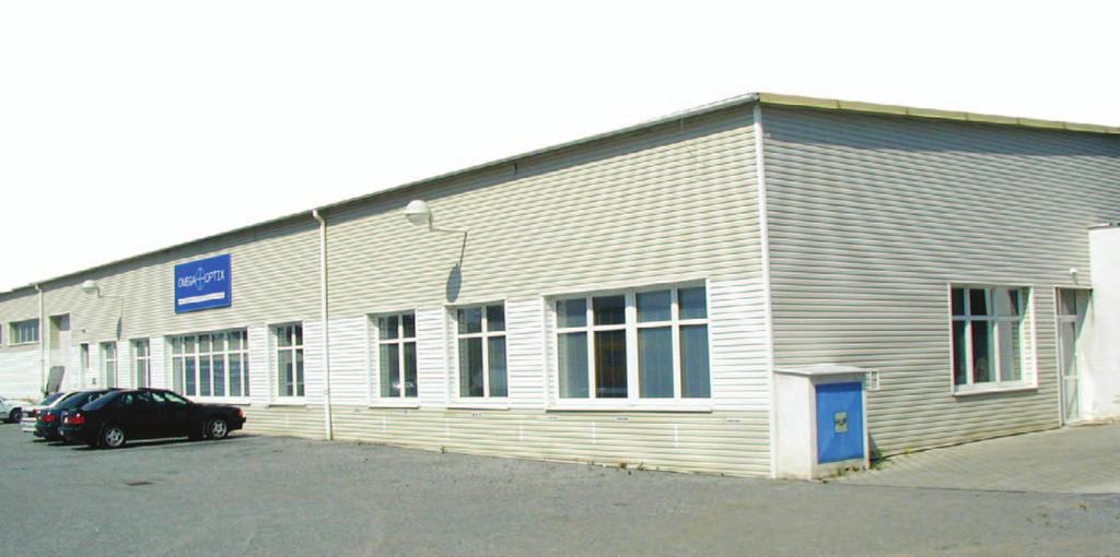 KOMERČNÍ PROSTORY Vinyl Siding vytváří na komerčních objektech kompaktní a zároveň texturově členité plochy.