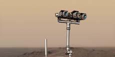 života na Marsu Rover s vrtákem a robotickou paží pro dopravu vzorků