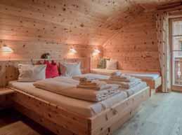 sociální zařízení se sprchou a vířivou vanou (oddělené WC), kachlová kamna, terasa, privátní sauna BS chalet - Jägerin - 6 m² - 1 ložnice s manželskou postelí, 1 ložnice se samostatnými lůžky,