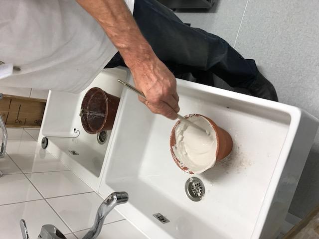 WE STARTED BY MIXING PLASTER