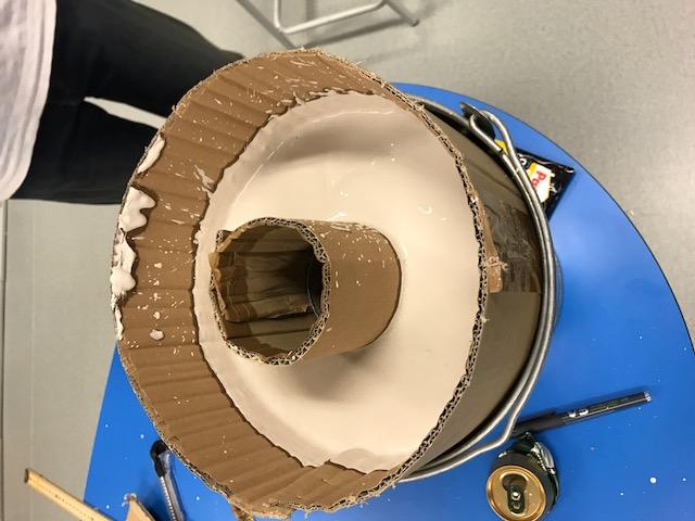 WE THEN USED CARDBOARD TO ALIGN THE BOTTOM AND REST OF THE