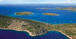 tz-brodarica.hr Krapanj je nejmenší, nejnižší a nejhustěji osídlený ostrov ve Středomoří o rozloze 0,36 km 2 a průměrné nadmořské výšce 1,5 m.